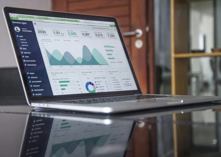 Laptop screen showing statistics and charts, representing ETF cost analysis