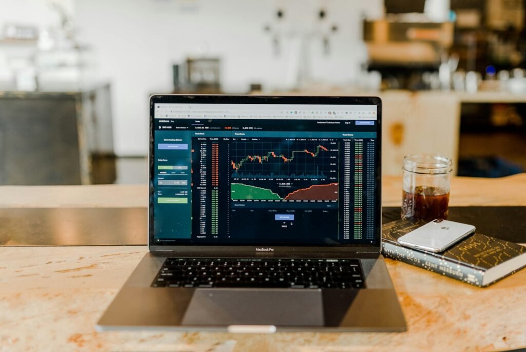 Investor viewing financial markets on a laptop