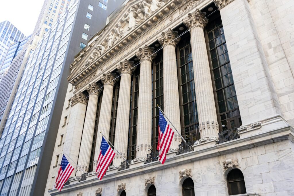 New York Stock Exchange building with American flags